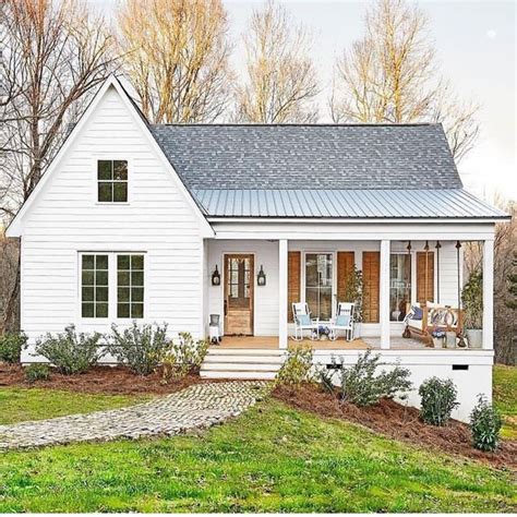 metal roof white farm houses|white house with cedar accents.